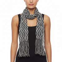 A gray and white wavy patterned scarf with fringed ends, shown on a plain white background.