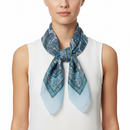 Blue and green patterned scarf on a white background