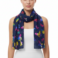 A navy scarf with a pattern of large multicolored butterflies.
