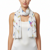 A white lightweight scarf with a colorful feather print, styled around the neck of a model wearing a white sleeveless top against a plain white background.