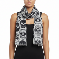 Scarf with black and white skull pattern on a white background