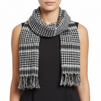 A black and white checkered scarf with tassels