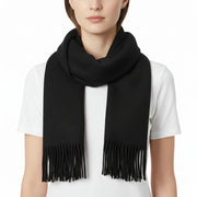 Black scarf with fringes on a white background