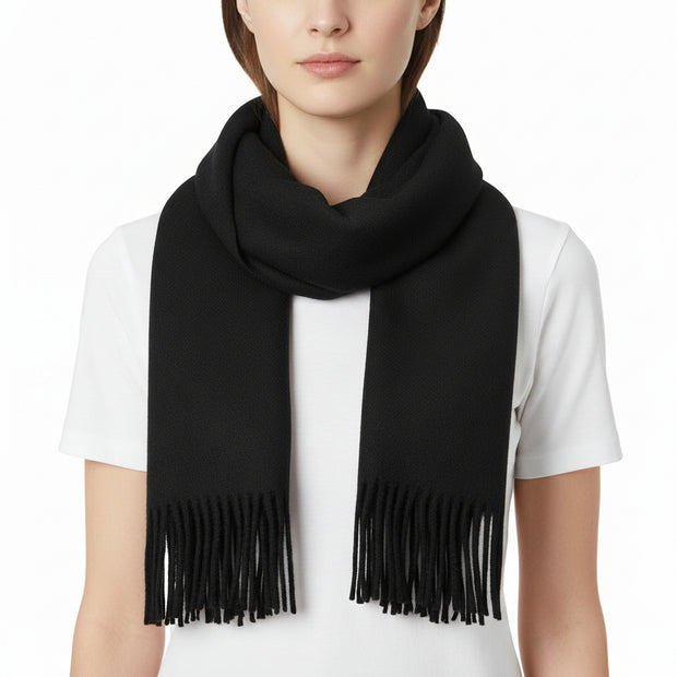 Black scarf with fringes on a white background