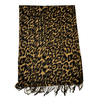 A long leopard print scarf draped over a plain surface.