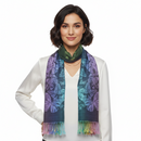 A woman modeling a long scarf with a butterfly pattern in shades of purple, blue, and green, featuring fringed ends, against a plain white background.