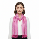 A pink pashmina scarf with a paisley print pattern and fringed edges.