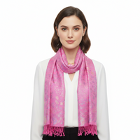 A pink pashmina scarf with a paisley print pattern and fringed edges.