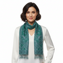 A turquoise paisley print pashmina scarf with tassels, displayed on a white background.