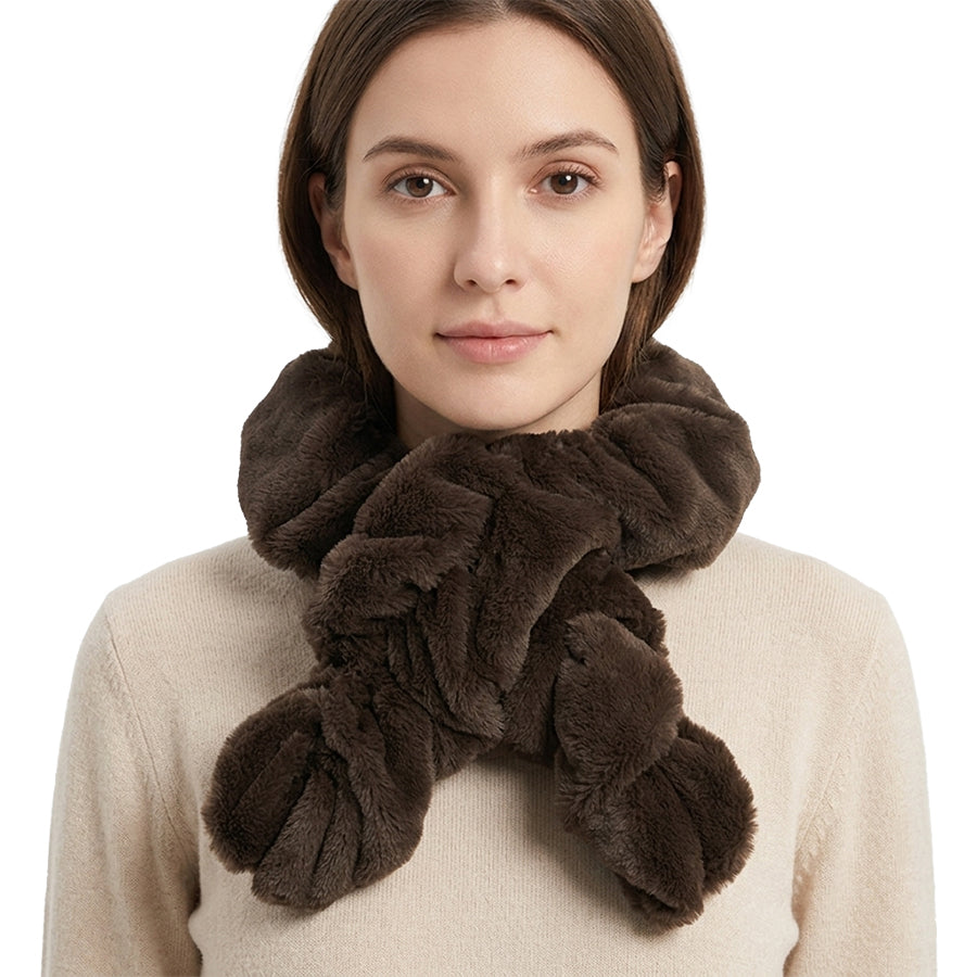 Woman wearing a brown faux fur scarf on a white background