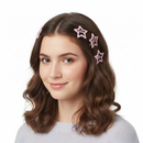 Six pink glittery star-shaped hair clips arranged in two columns of three on a plain white background.