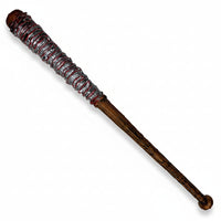 A bronze-colored baseball bat with bloody barbed wire wrapped around it.