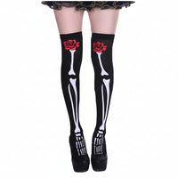 A pair of black thigh-high stockings featuring a white skeleton pattern and red rose applications.