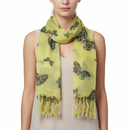 Yellow scarf with black butterfly patterns on a white background