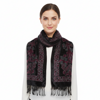 A black rectangular scarf with ornate floral embroidery in pink, red, and gray, finished with a fringed hem, shown against a plain white background.