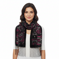 A black rectangular textile wall hanging or tapestry with an abstract geometric pattern in bright pink, gray, and black, finished with long fringe along the bottom edge, shown against a plain white background.