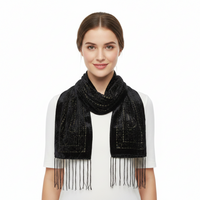 A black woven scarf with intricate paisley and geometric patterns, featuring a fringed hem, displayed against a solid white background.