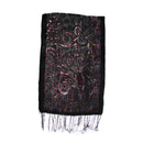 A black scarf with intricate pink, purple, and gold sequined patterns and fringed ends, displayed against a plain white background.