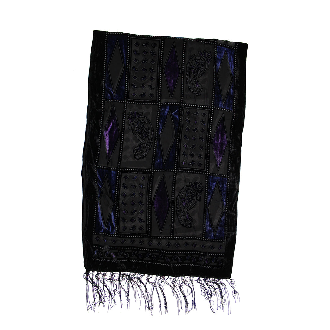 A black embroidered prayer shawl with purple accents, featuring geometric and floral patterns, a decorative border, and fringed edges, shown against a plain white background.