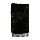 A black scarf with gold and blue abstract patterns and fringed edges, shown flat against a white background.