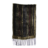 A rectangular black velvet scarf with vertical metallic gold stripes and a fringed bottom edge, shown against a plain white background.