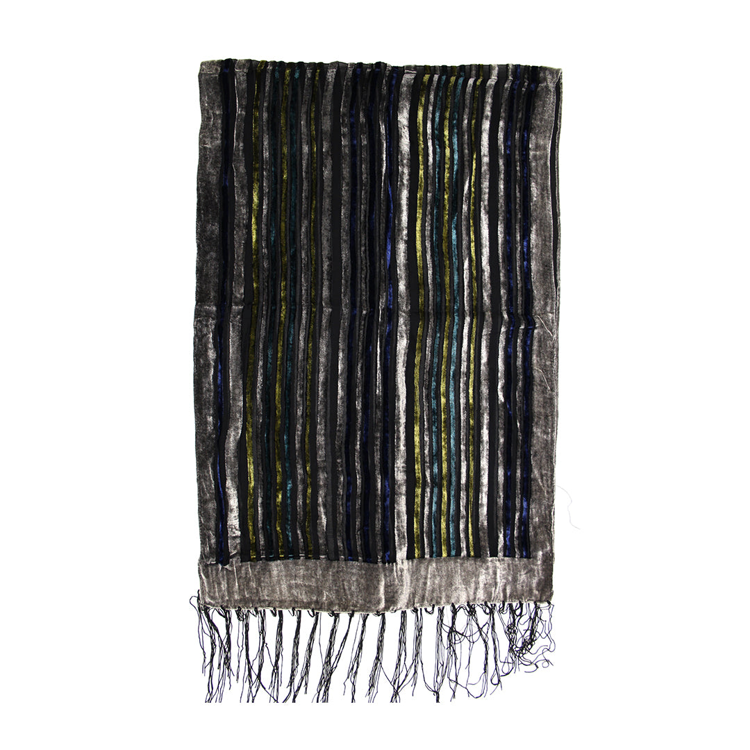 A rectangular scarf with a textured, metallic silver-gray base and vertical stripes in black, navy, and olive green, finished with a fringed hem.