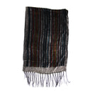 A rectangular woven textile with vertical multicolor stripes in black, gray, red, and green, finished with a fringed hem, shown against a plain white background.