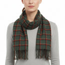 A checkered scarf in green, red, and black with fringes, displayed on a white background.