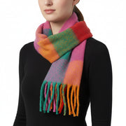 A multicolored checkered scarf with fringes displayed on a white background