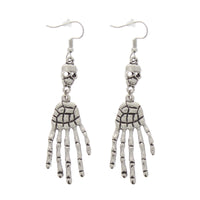 Hanging Skeleton Hands off Skulls Earrings