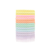 A collection of pastel-colored hair combs displayed vertically, with the top comb in yellow and the bottom comb in purple.