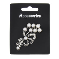 Bow Shaped Brooch with Clear Crystal Stones