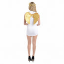 A person wearing gold feather wings attached to a white outfit, standing on one leg with the other foot raised, wearing black high heels.